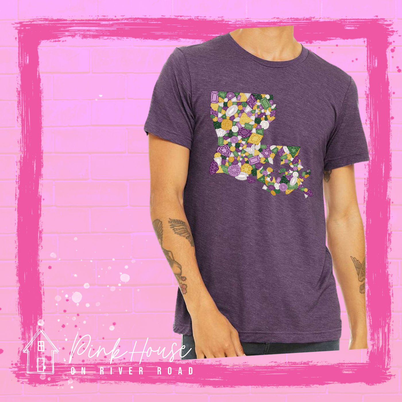 Heathered dark purple tee with a graphic of the state of Louisiana compromised of different shapes and sizes of purple, green, yellow and clear jewels.