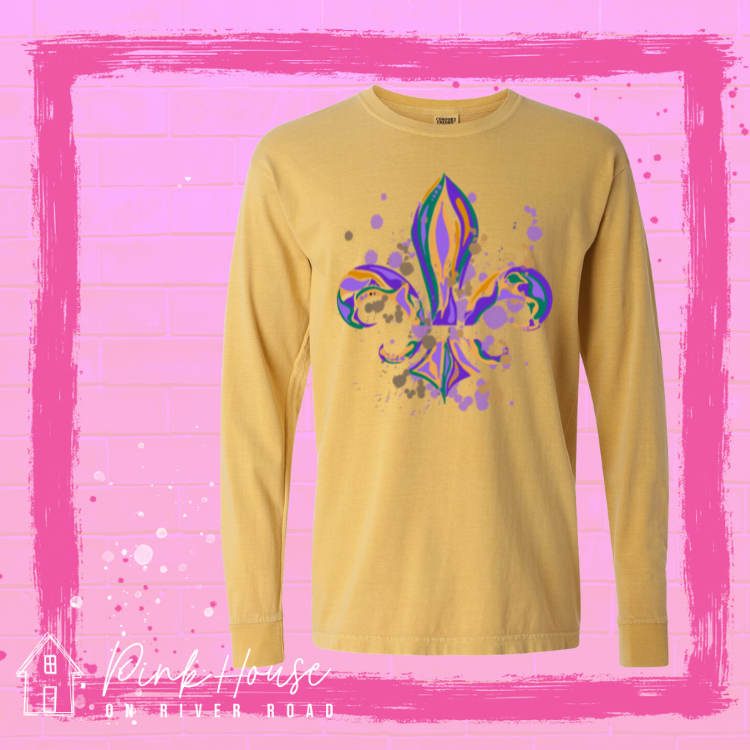 Mustard long sleeve tee with a Fleur de Lis made up of layered green, yellow, and purple with green, yellow and purple colored splatters.