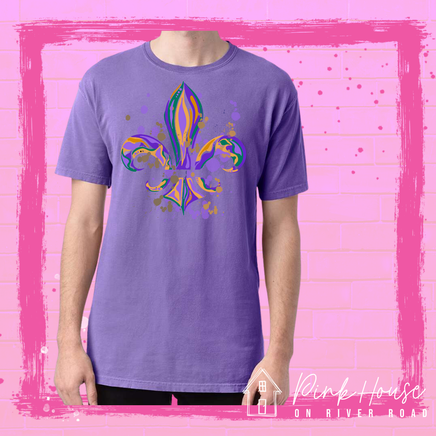Purple tee with a Fleur de Lis made up of layered green, yellow, and purple with green, yellow and purple colored splatters.