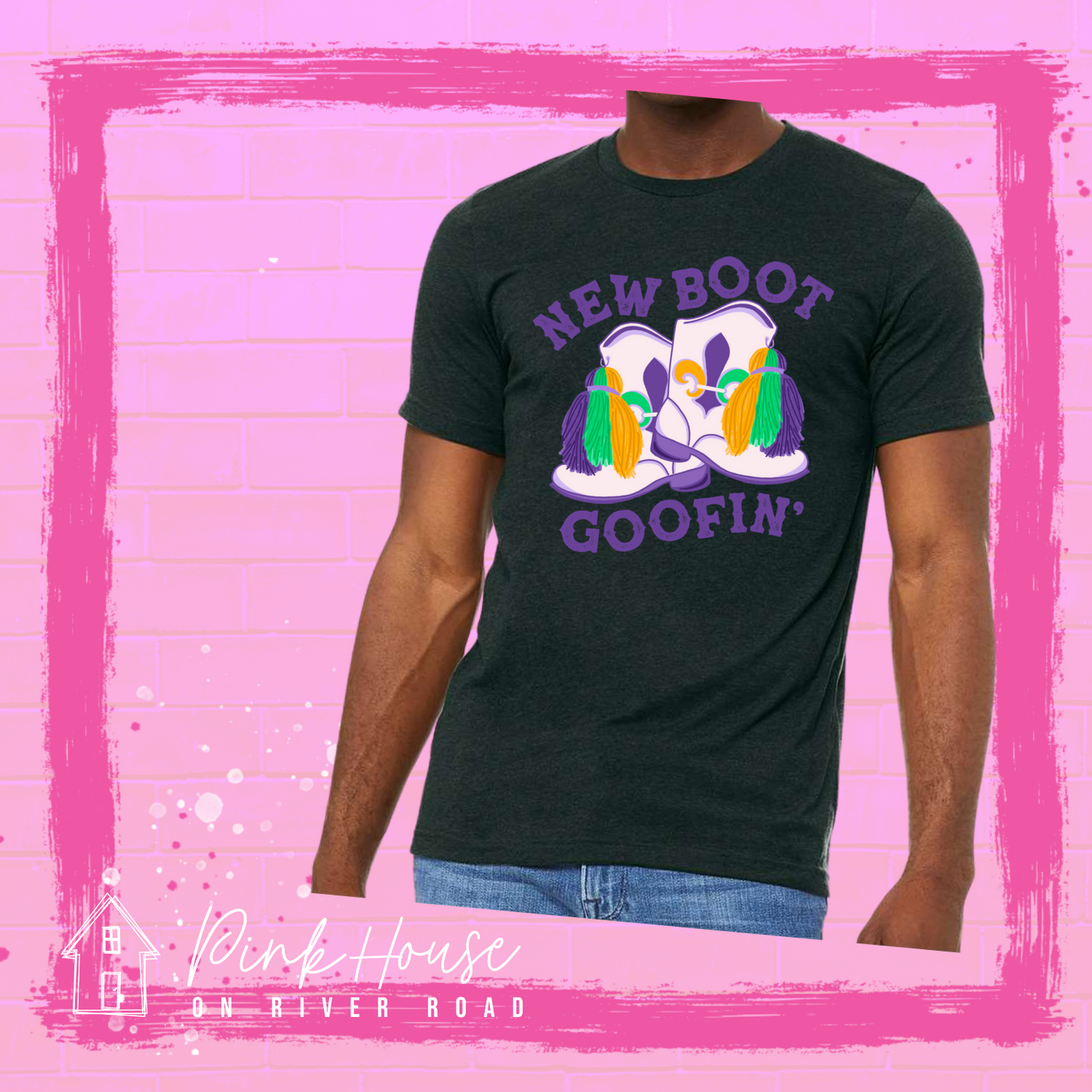 A dark green tee with a graphic. Graphic is of a pair of majorette boots, the boots have a tassel and fleur de lis both in gold, green and purple. the words New Boot are above the boots and the word goofin' is below thee boots the words are in purple.