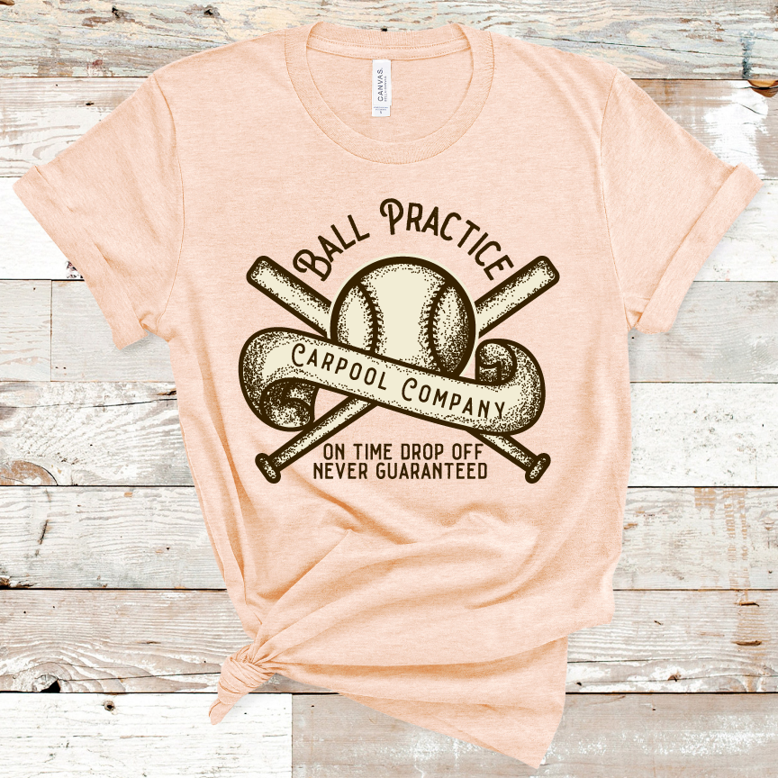 Heather Peach tee. Graphic has a baseball with two bats crossed behind it and a banner across the baseball that says carpool company. Text above the graphic says Ball practice and underneath it says on time drop off never guaranteed. Graphic is off white with brown and brown text.
