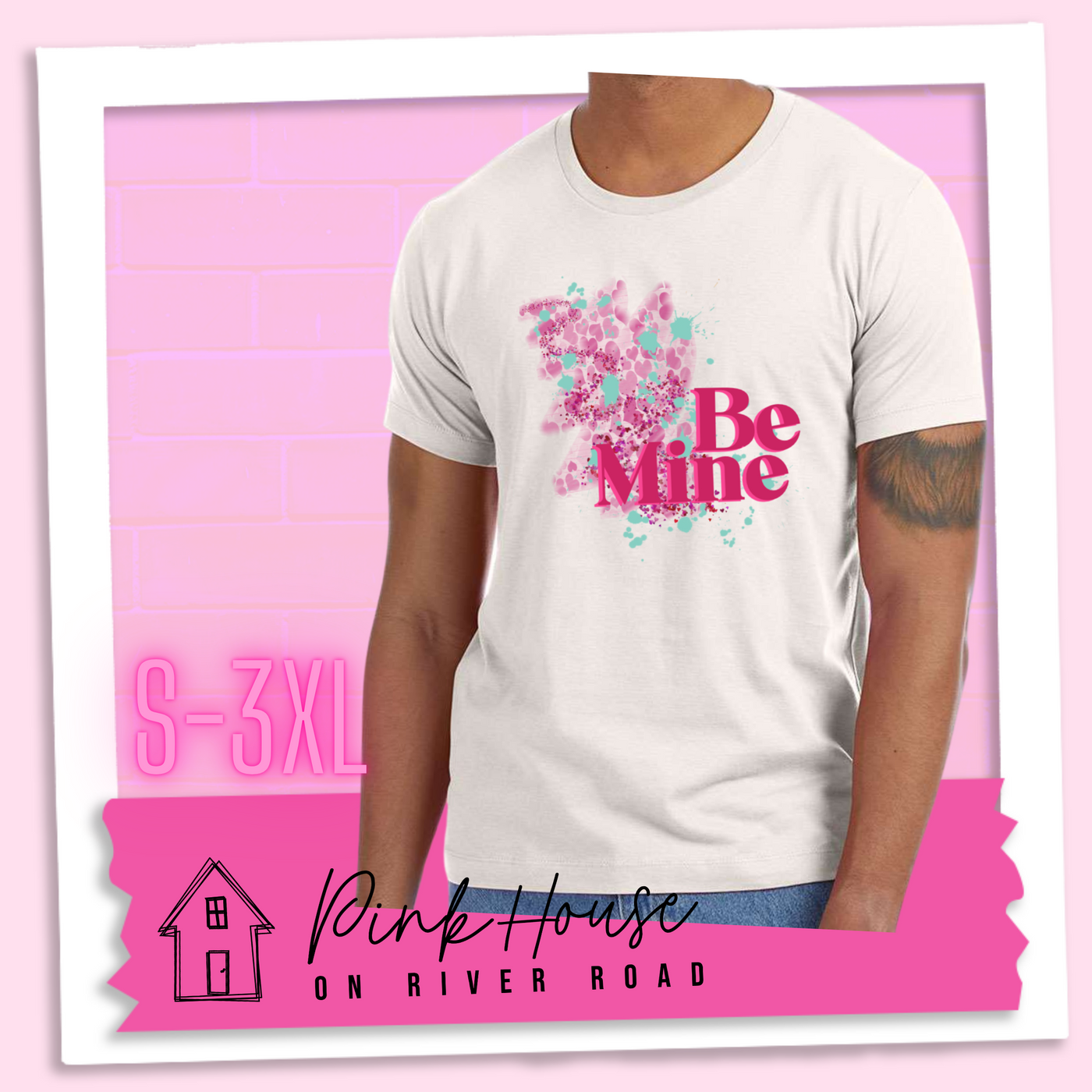 Dust Tee with a squiggle design made of pink hearts and pink sparkles with light teal splatters and pink text at the end of the art that says Be Mine with a hot pink shadow.