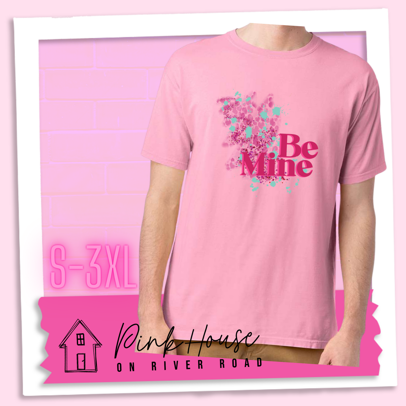 Cotton Candy Tee with a squiggle design made of pink hearts and pink sparkles with light teal splatters and pink text at the end of the art that says Be Mine with a hot pink shadow.