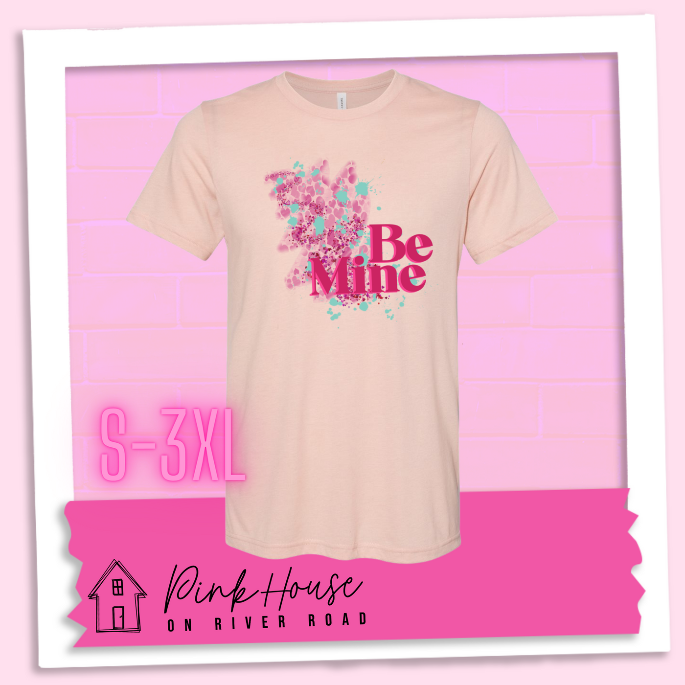 Heather Peach Tee with a squiggle design made of pink hearts and pink sparkles with light teal splatters and pink text at the end of the art that says Be Mine with a hot pink shadow.