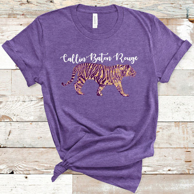 Heather Purple Tee. Graphic has a tiger in the LSU colors of purple and gold text above the tiger reads callin baton rouge in cursive