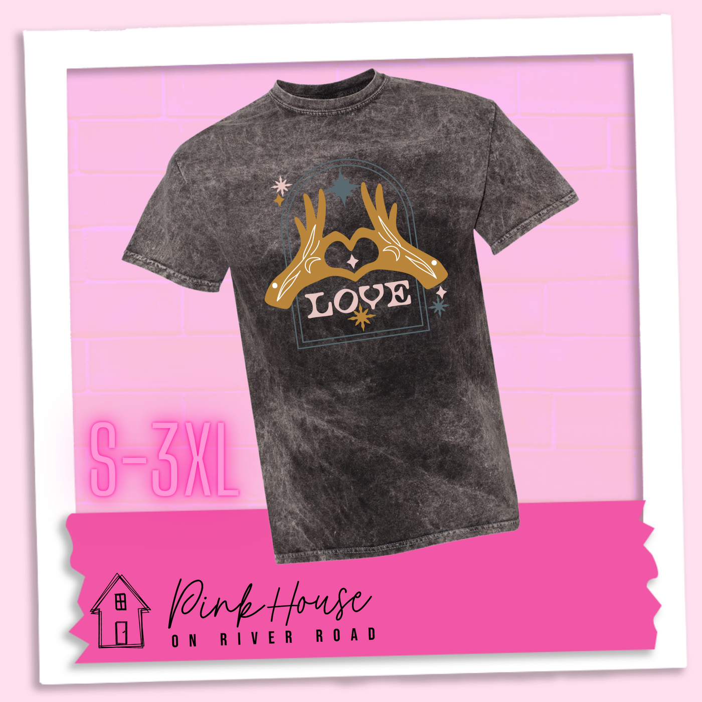 Black Mineral Wash tee with a graphic. Graphic is of two tattooed hands making a heart in front of an archway with stars and the word Love in the archway.