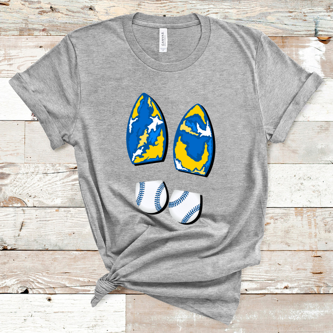 Athletic Grey Tee. Graphic is a pair of boot prints, The heel is a baseball print with blue stitching the sole is a abstract Royal, white, and yellow print.