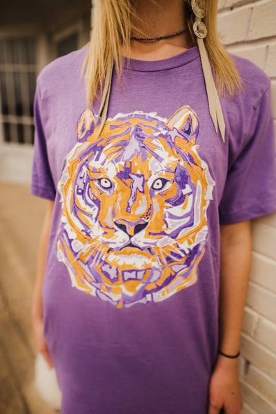 Purple Tee with a white, orange and purple layered tiger graphic