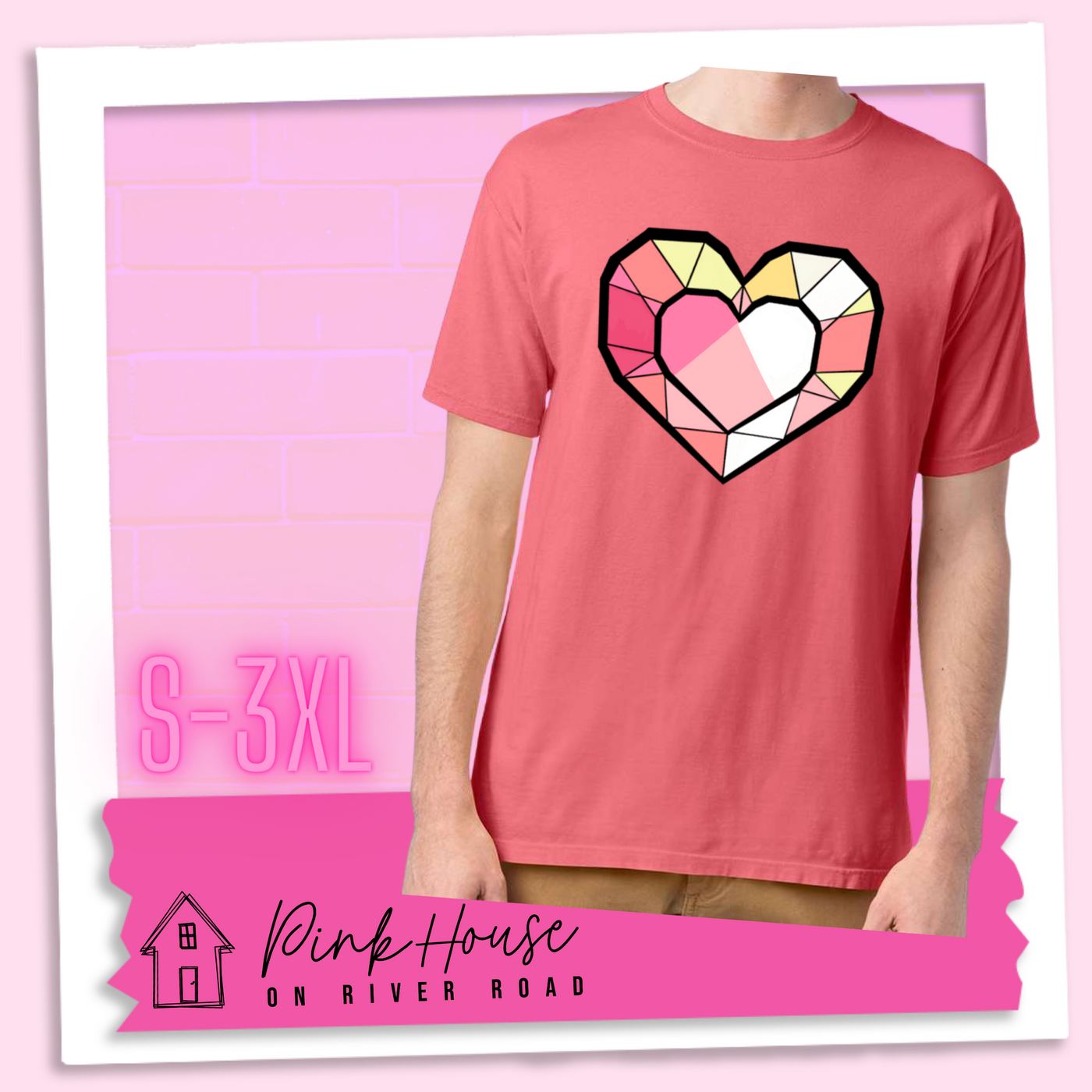 Coral graphic tee. the graphic is of a geometric heart, it has black outlines to make it look like a gem with different shades of pinks, yellows, and white.