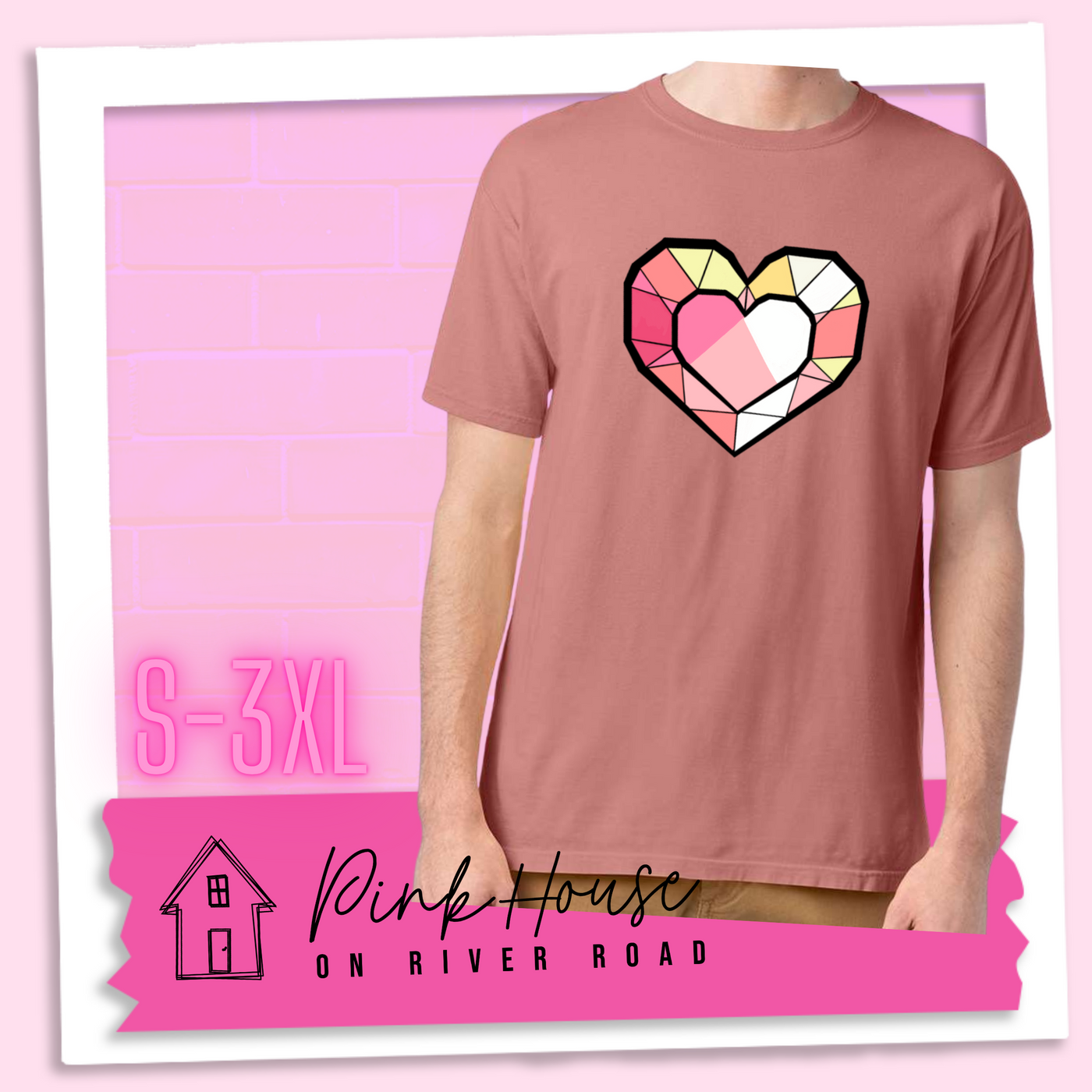 Mauve graphic tee. the graphic is of a geometric heart, it has black outlines to make it look like a gem with different shades of pinks, yellows, and white.