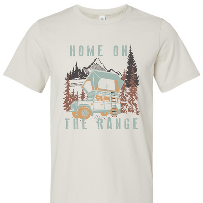 Dust Colored Tee. Graphic is a mountain scene with a 4x4 camping vehicle with a tent on top. vehicle is a light blue with yellow accents. The words Home on the Range are in light blue.