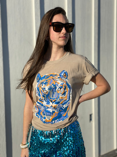Natural tan tee with a white, orange and blue layered tiger graphic