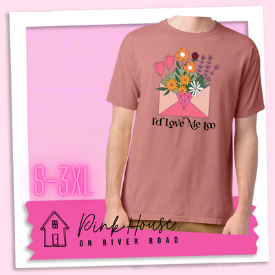 Mauve tee with a graphic of a pink envelope filled with different types of flowers and a geometric heart seal. The text underneath reads "I'd Love Me Too"