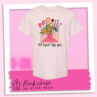 Faded Pink tee with a graphic of a pink envelope filled with different types of flowers and a geometric heart seal. The text underneath reads "I'd Love Me Too"