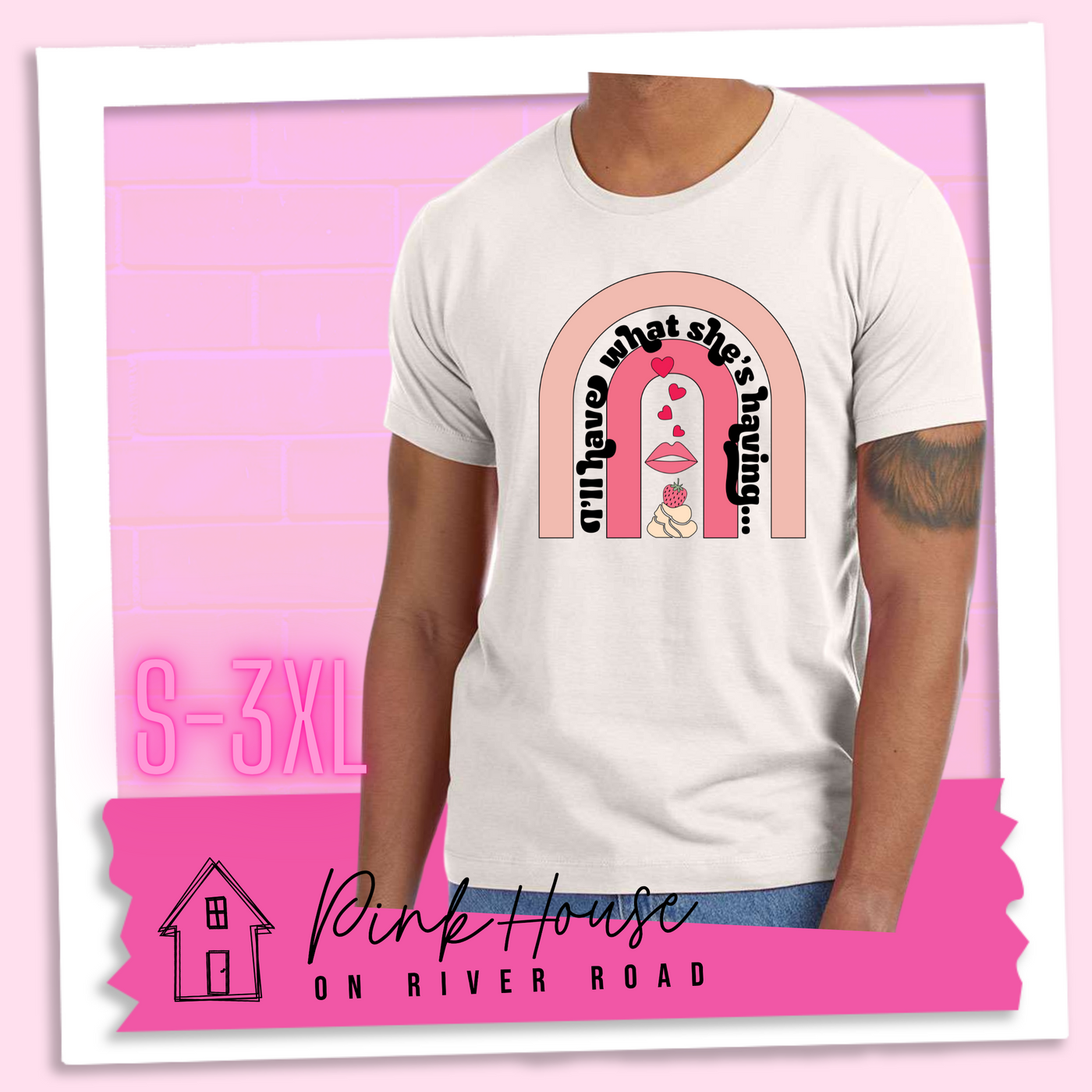 Dust tee with a graphic of a strawberry dessert and a set of lips with hearts, there is a pink arch going over the art. There is a retro font arched over the pink art that says "I'll have what she's having..." in black with another arch above that in light pink.