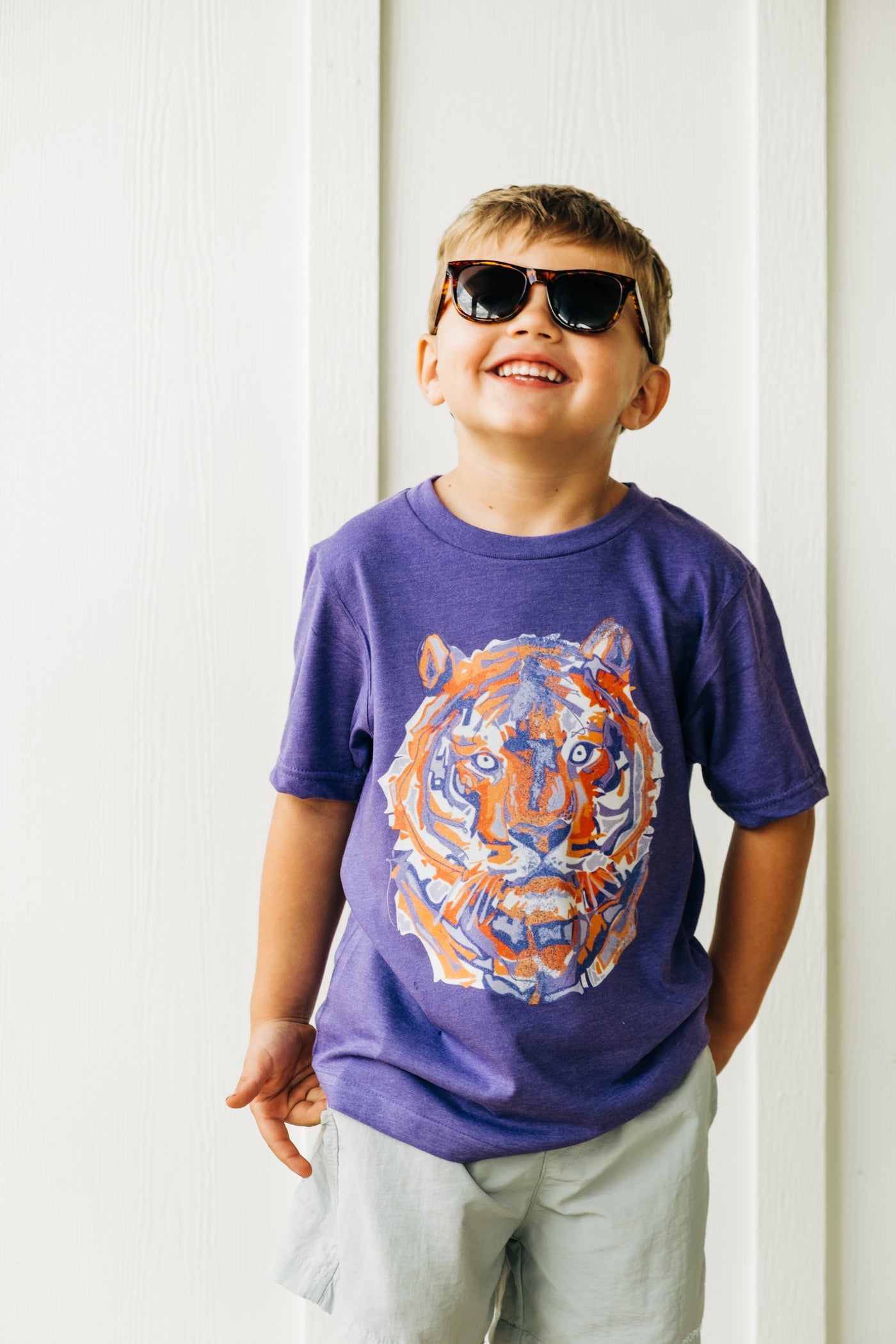 Purple tee with a white, orange and purple layered tiger graphic