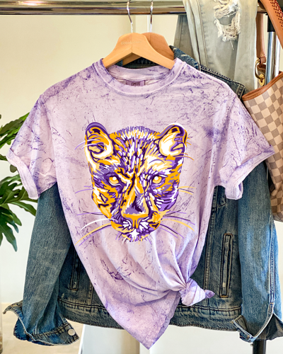 Amethyst Colorblast shirt with a yellow, white and purple layered panther graphic