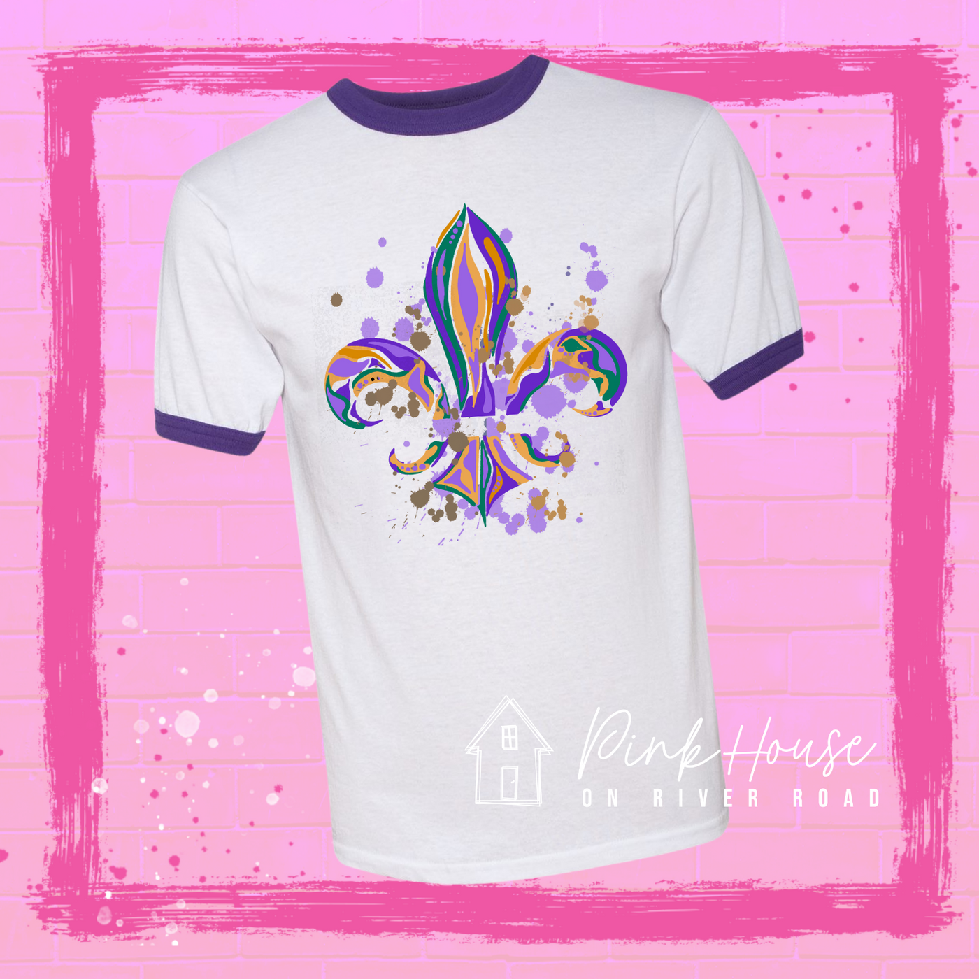 White and purple ringer tee with a Fleur de Lis made up of layered green, yellow, and purple with green, yellow and purple colored splatters.