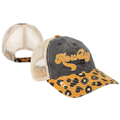 A mesh trucker hat with a cream mesh back, black stonewash front and a leopard print bill and the word howdy in a yellow retro font.