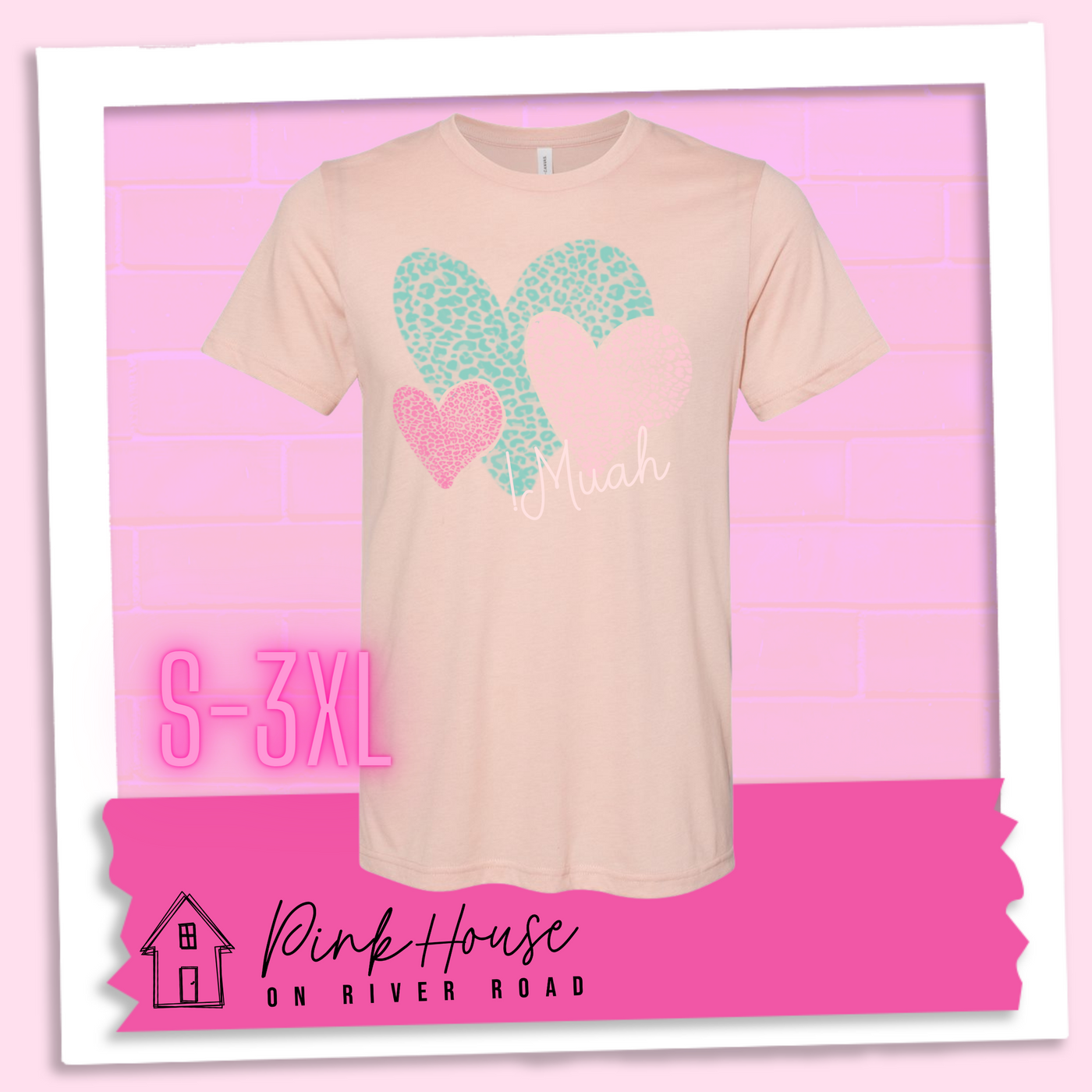 Heather Peach tee with 3 different colored leopard print hearts in various sizes in the lower right hand corner of the graphic is the word Muah in light punk script