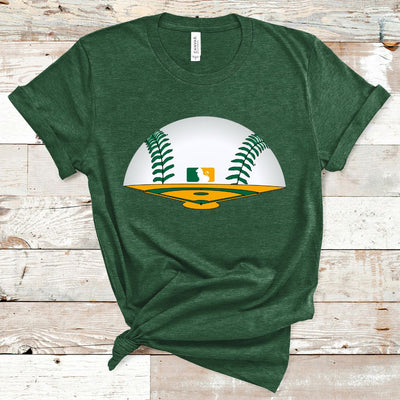 Grass Green Tee. Graphic is a green and yellow baseball field The horizon is a baseball with green laces and there is a baseball symbol in yellow and green with a lion in the middle near center field.