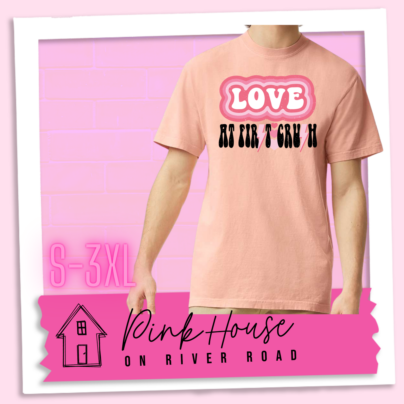 Peachy Tee. The graphic has the word Love in retro bubble letters with differetn colored pink outlines radiating from the word, underneath are the worxs at first in black with the s in first replaced with a pink lightning bolt, then there are three different colored hearts followed by the word crush in the same black font with the S replaced with the same pink lightening bolt.