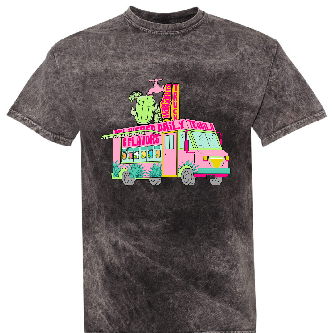 Black Mineral Wash. Graphic has a food truck that delivers margaritas. Truck is pink with words that say Delivered Daily Tequila 6 Flavors across the top. The side of the truck has 6 different drink dispensers and the top of the truck has a spot and margarita pitcher.