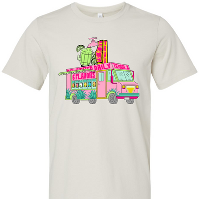 Dust Tee. Graphic has a food truck that delivers margaritas. Truck is pink with words that say Delivered Daily Tequila 6 Flavors across the top. The side of the truck has 6 different drink dispensers and the top of the truck has a spot and margarita pitcher.