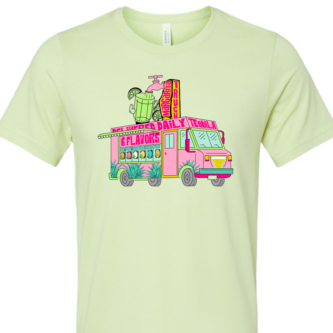 Spring Green Tee. Graphic has a food truck that delivers margaritas. Truck is pink with words that say Delivered Daily Tequila 6 Flavors across the top. The side of the truck has 6 different drink dispensers and the top of the truck has a spot and margarita pitcher.