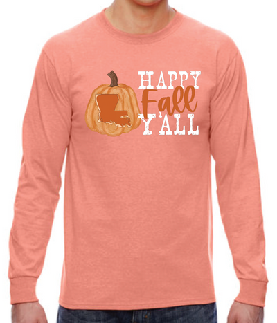 A peach shirt with a pumpkin with the state of Louisiana carved out, The words Happy Fall Y'all is to the right of the pumpkin. The words Happy and Y'all are in white and the word fall is in orange cursive.