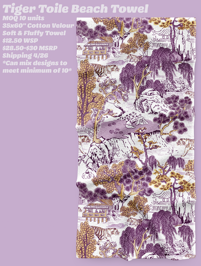 A beach towel with a Japanese print. The color scheme is purple and gold and there are tigers in the scene among the buildings and trees