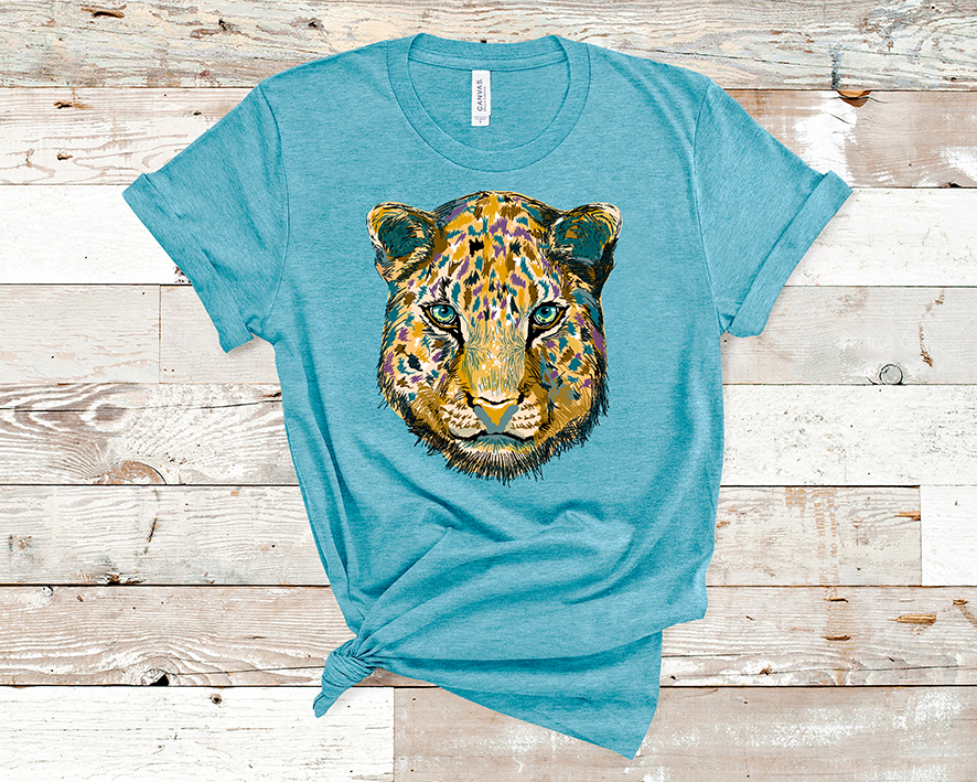Heather Aqua shirt with a graphic of a jaguar layered with blue purple and brown spots.