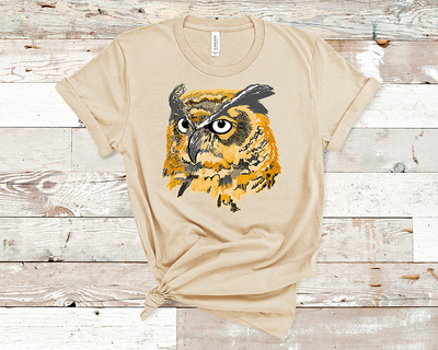 Natural Tan shirt with a graphic of a yellow, orange and gray layered owl