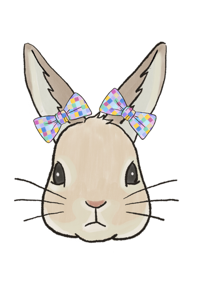 a bunny wearing bows covered in multi colored squares on both ears